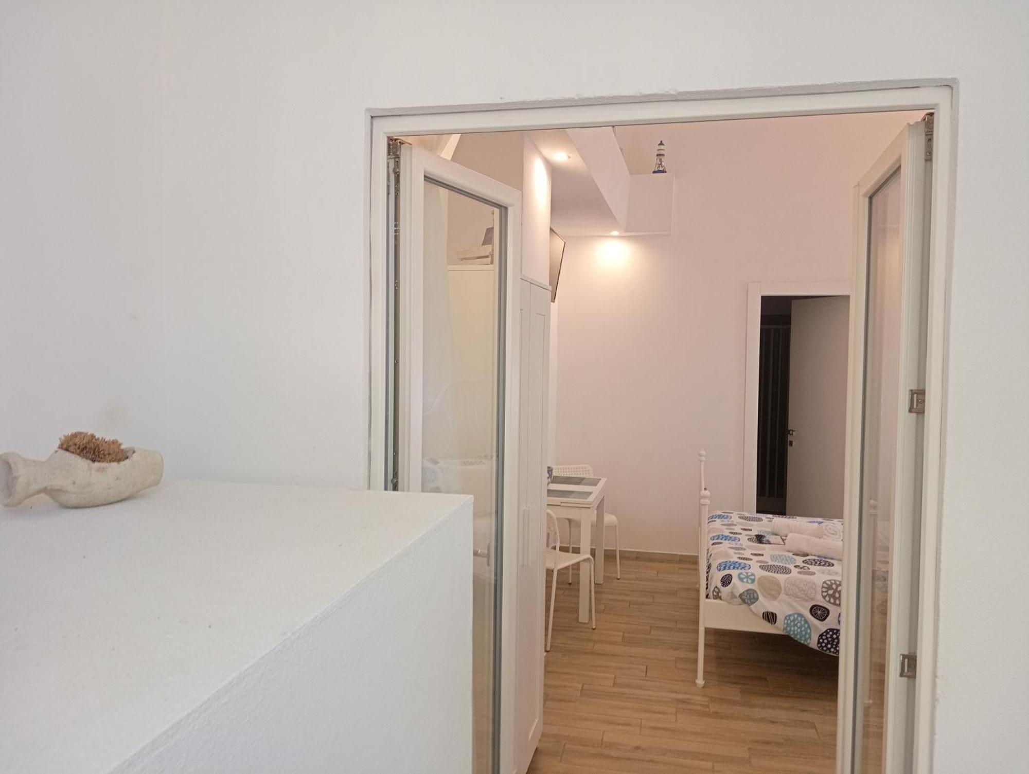 White Shell Rooms Accomodation Fast Check-In 阿尔盖罗 外观 照片